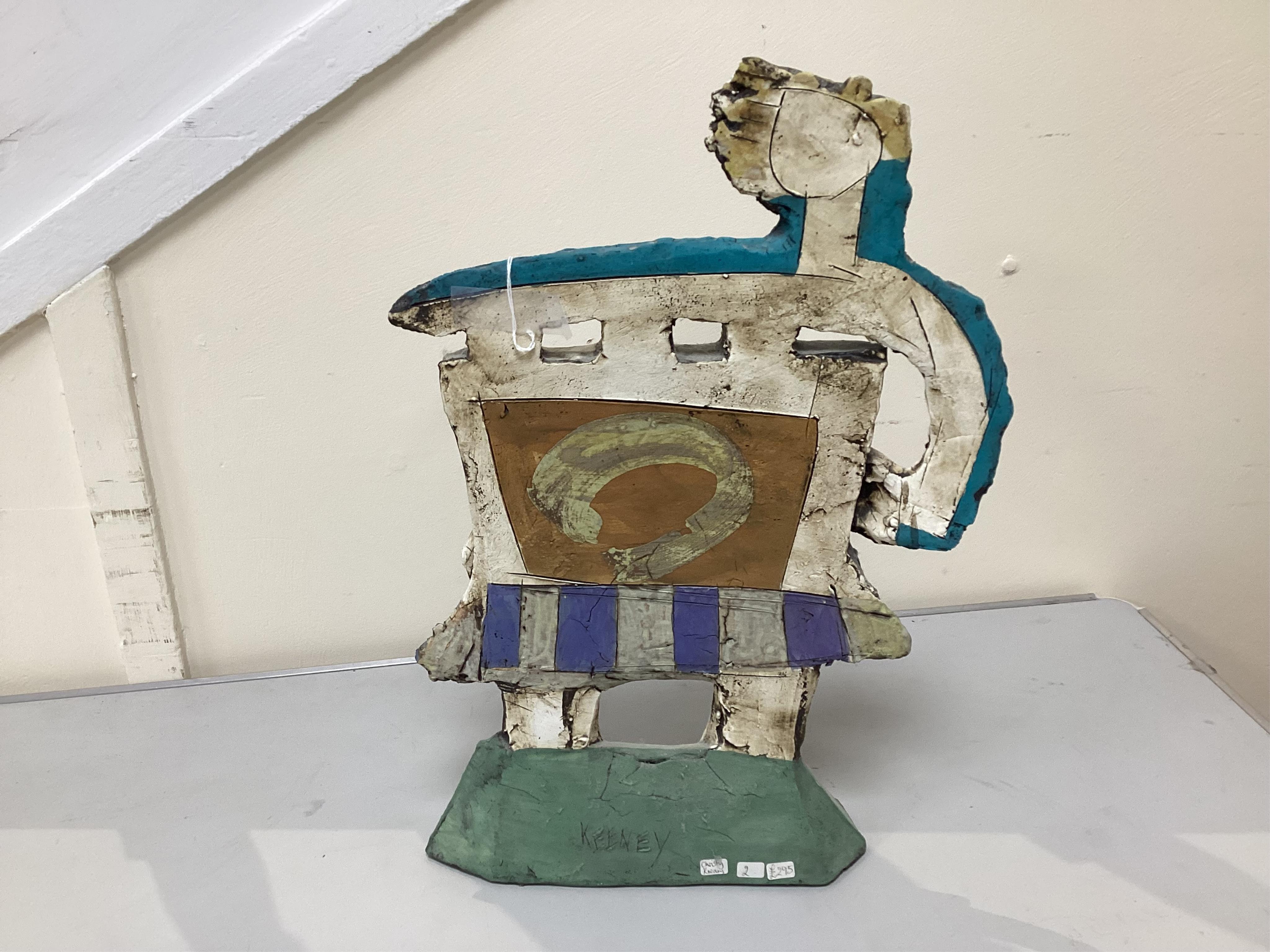 Christy Keeney (b.1958) Figure of a accordian player, 42.5cm high